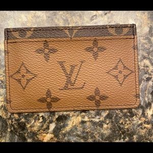 Like new used once, Louis Vuitton Monogram Reverse card holder